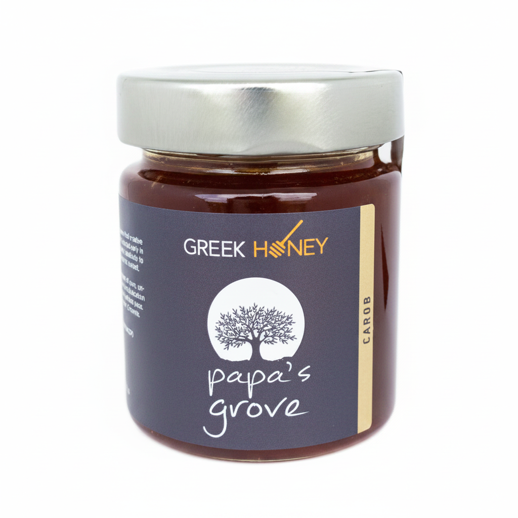 A jar of Greek Honey from Papa's Grove, featuring a dark label with a tree logo and a silver metal lid, set against a plain white background.