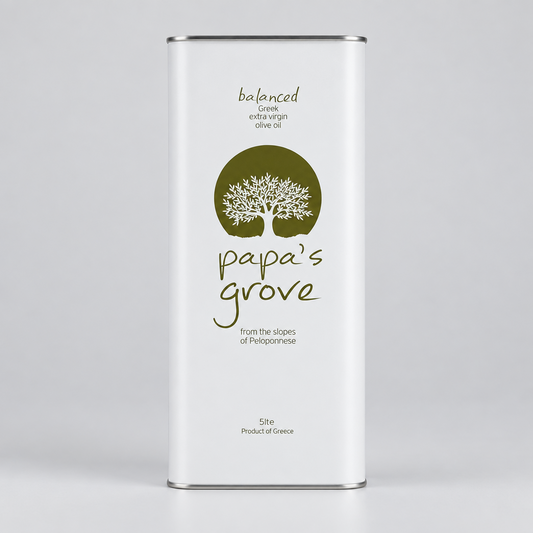 A tall rectangular metal tin of Papa's Grove balanced Greek extra virgin olive oil, featuring a white body with a dark olive green circular tree logo and brown script text, set against a neutral light gray background.