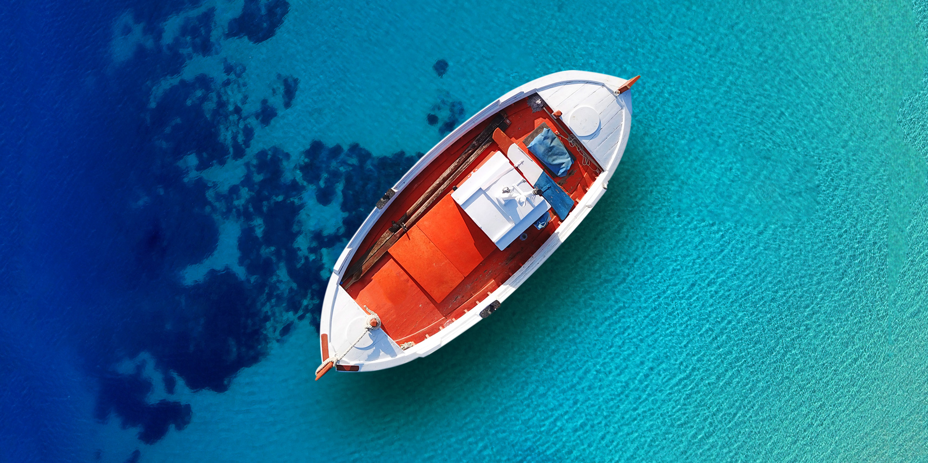 Boat in Blue Sea